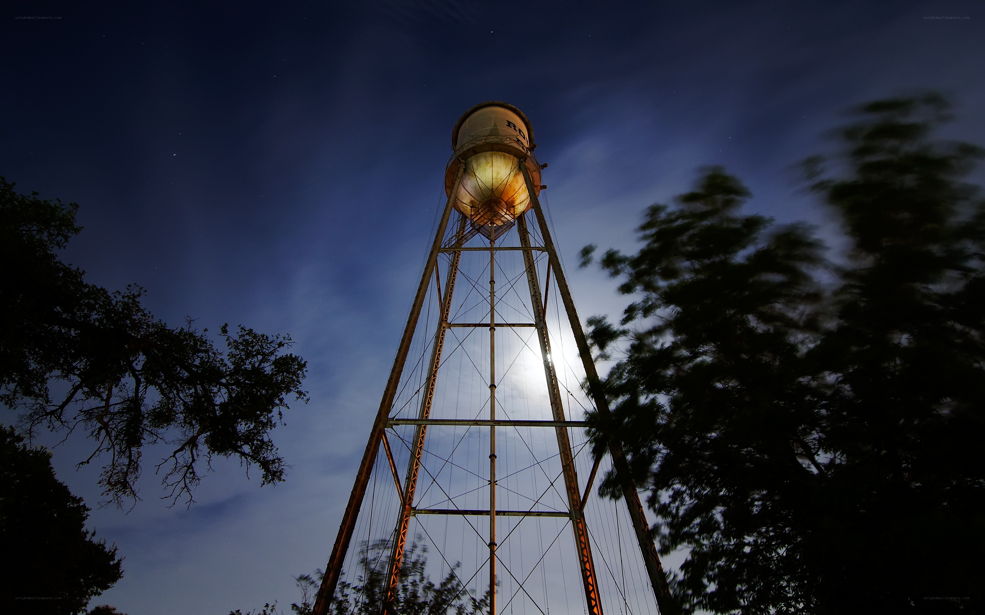 Water tower at night
