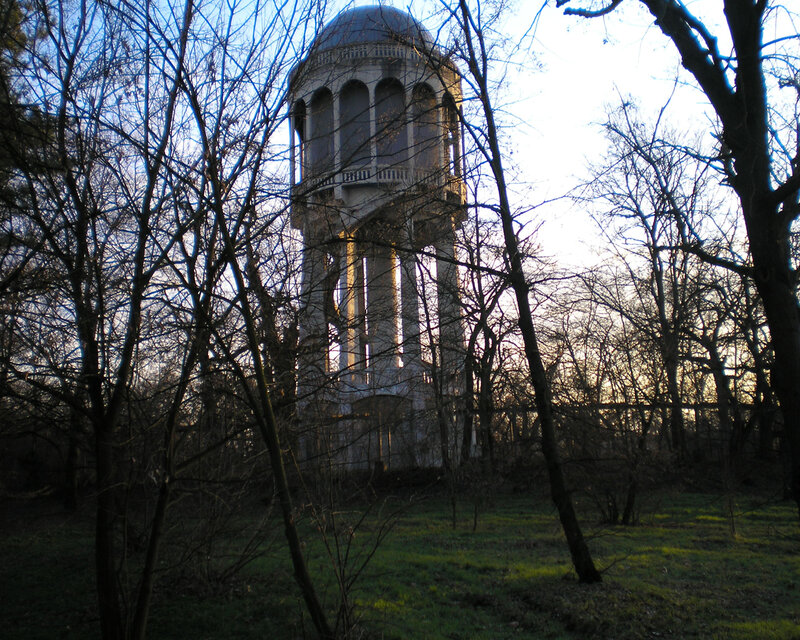 Water tower in a wooded area