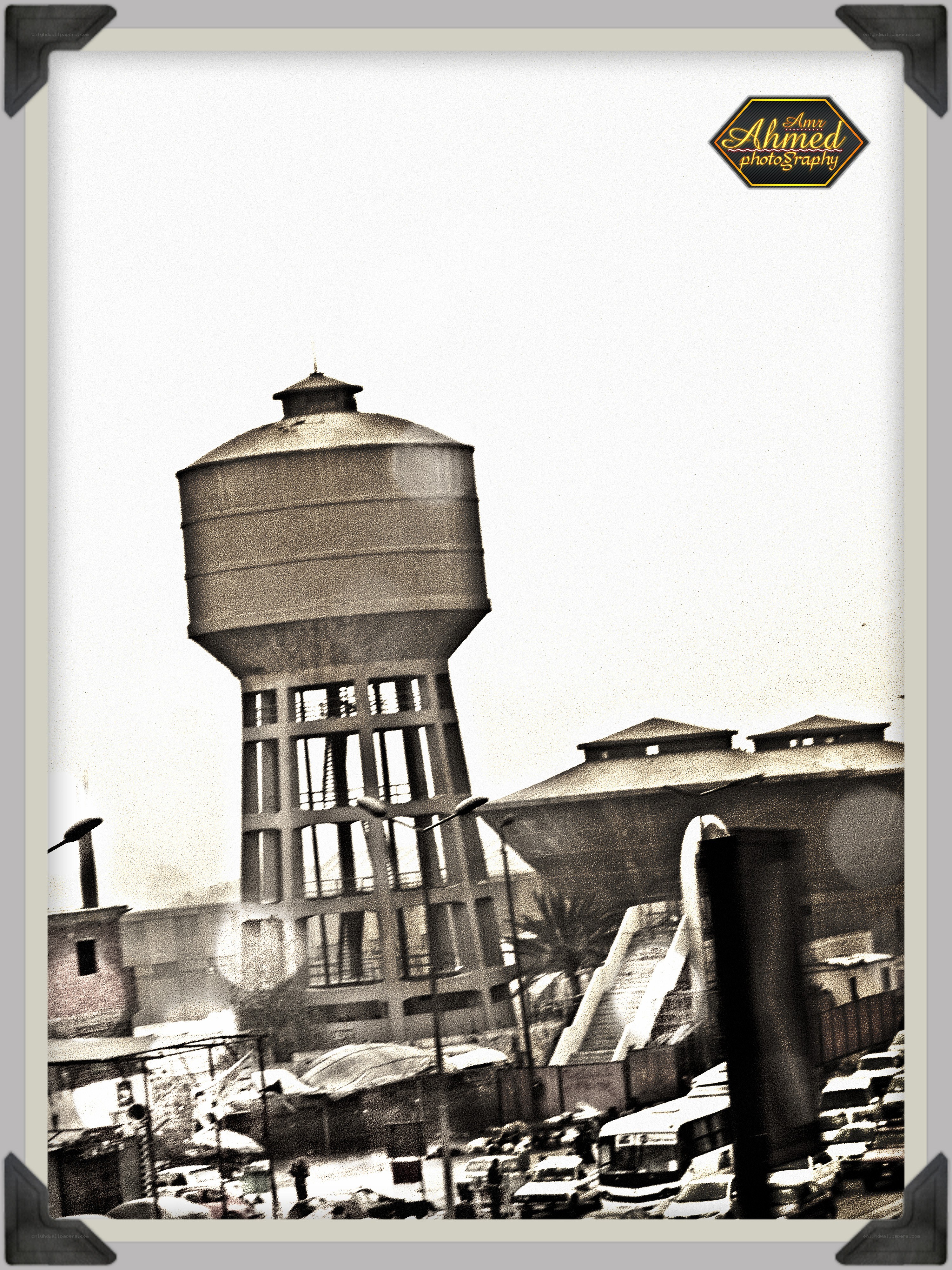 Water tower in urban area