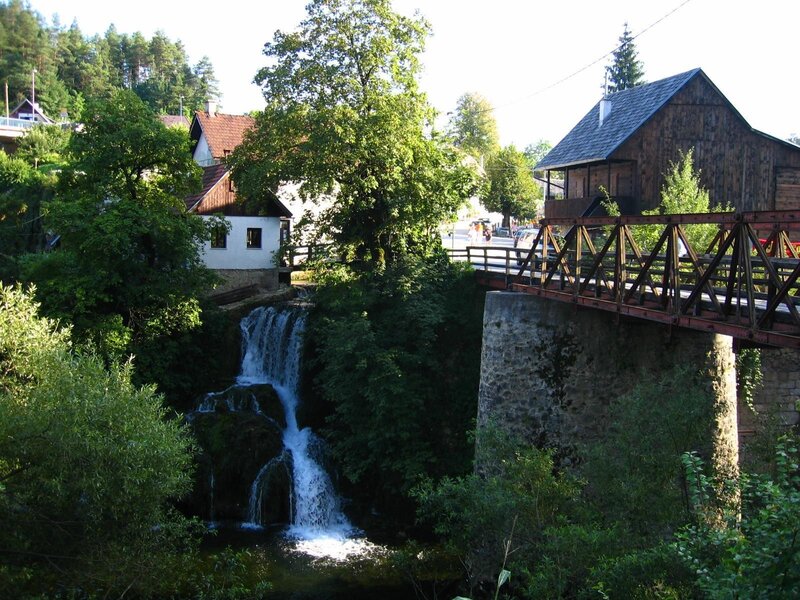 Waterfall and bridge in a village