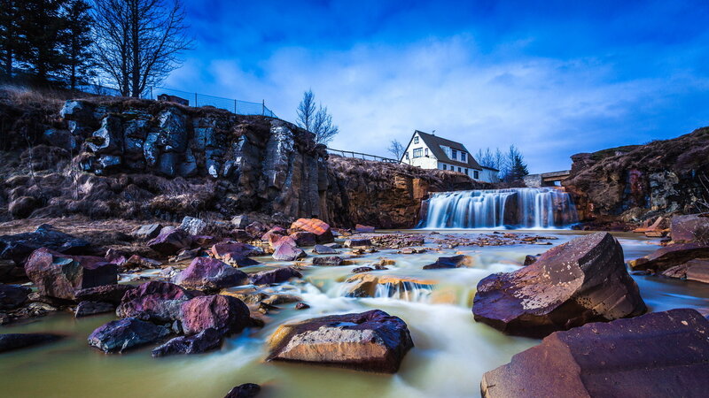 Waterfall and House