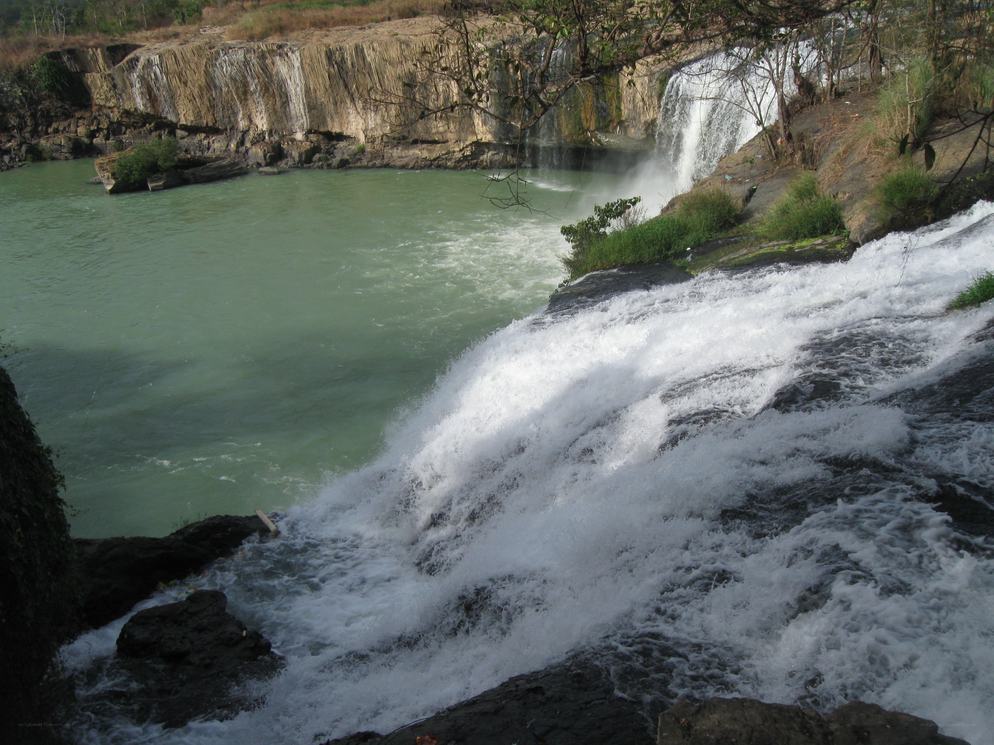 Waterfall at a river bend
