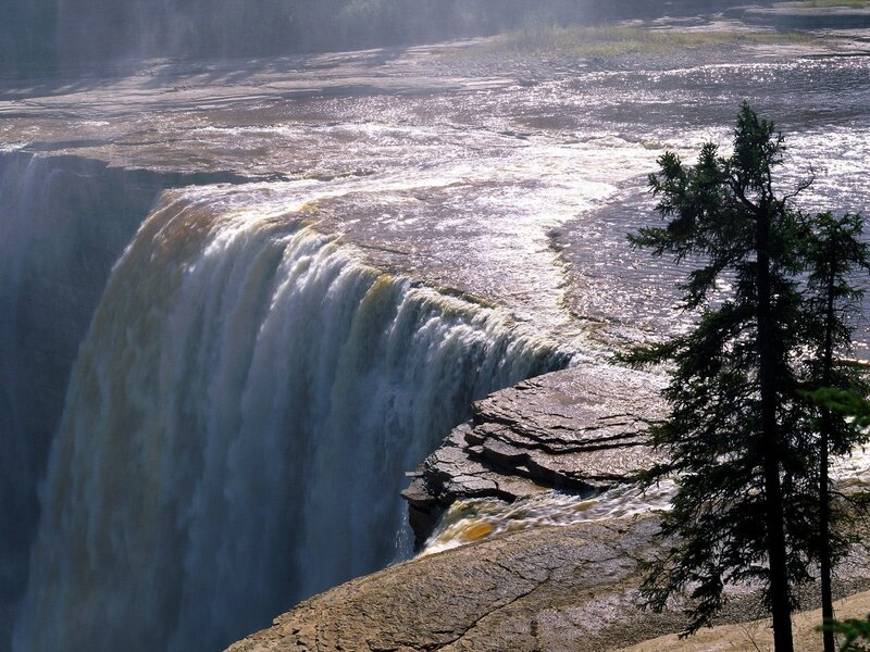 Waterfall at a river bend