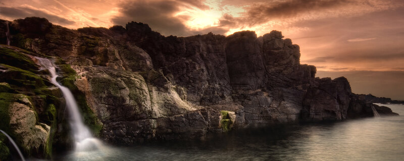 Waterfall at coastal cliffs