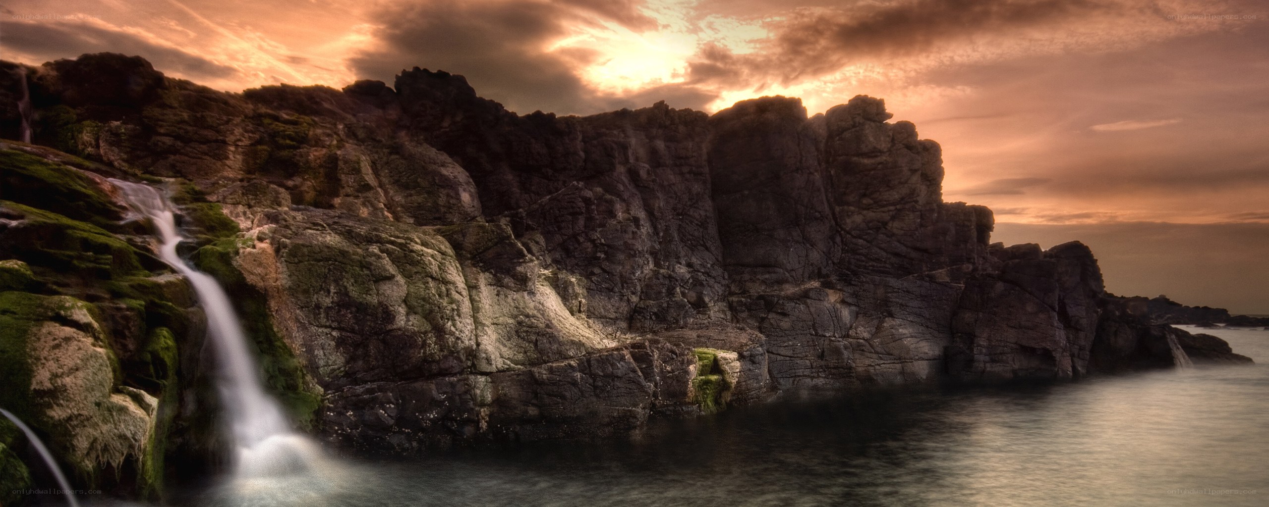 Waterfall at coastal cliffs