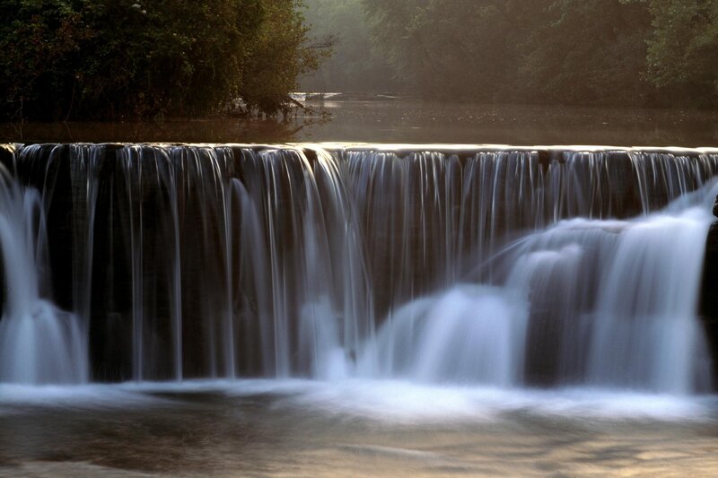 Waterfall at dawn in forest