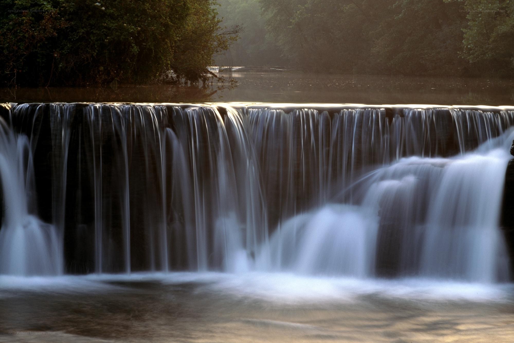 Waterfall at dawn in forest