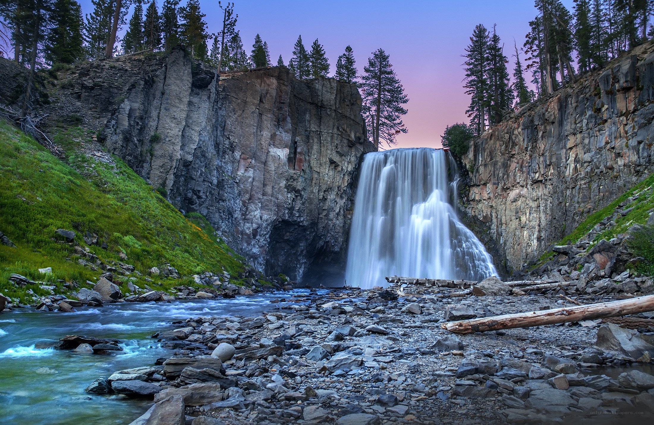 Waterfall at dusk in a forest
