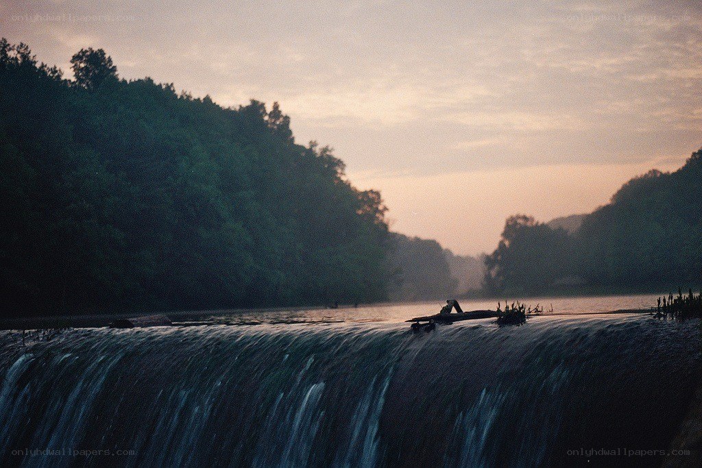 Waterfall at dusk in forest