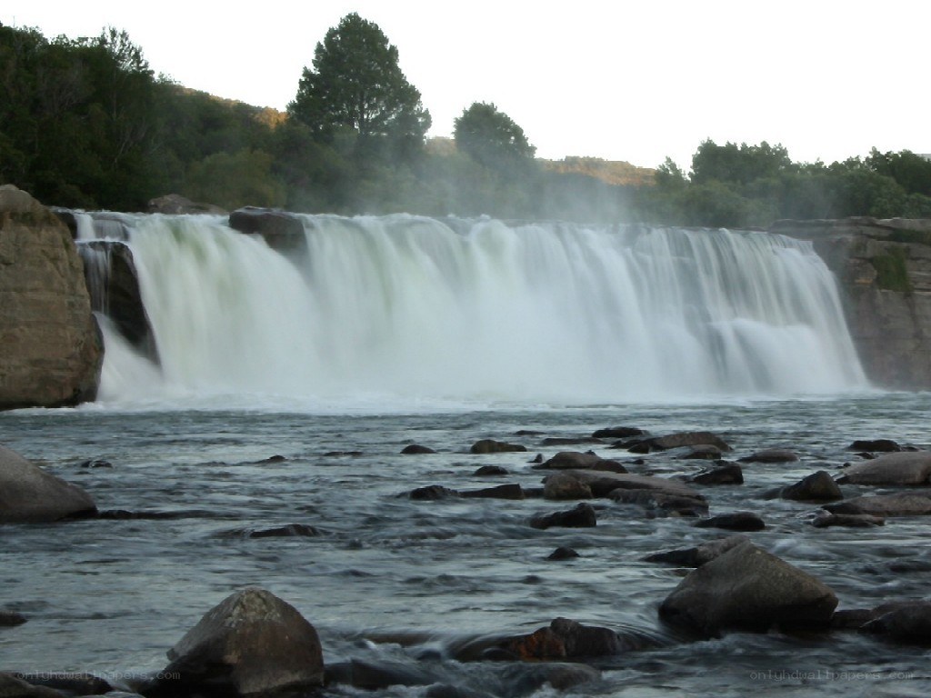 Waterfall at dusk with mist