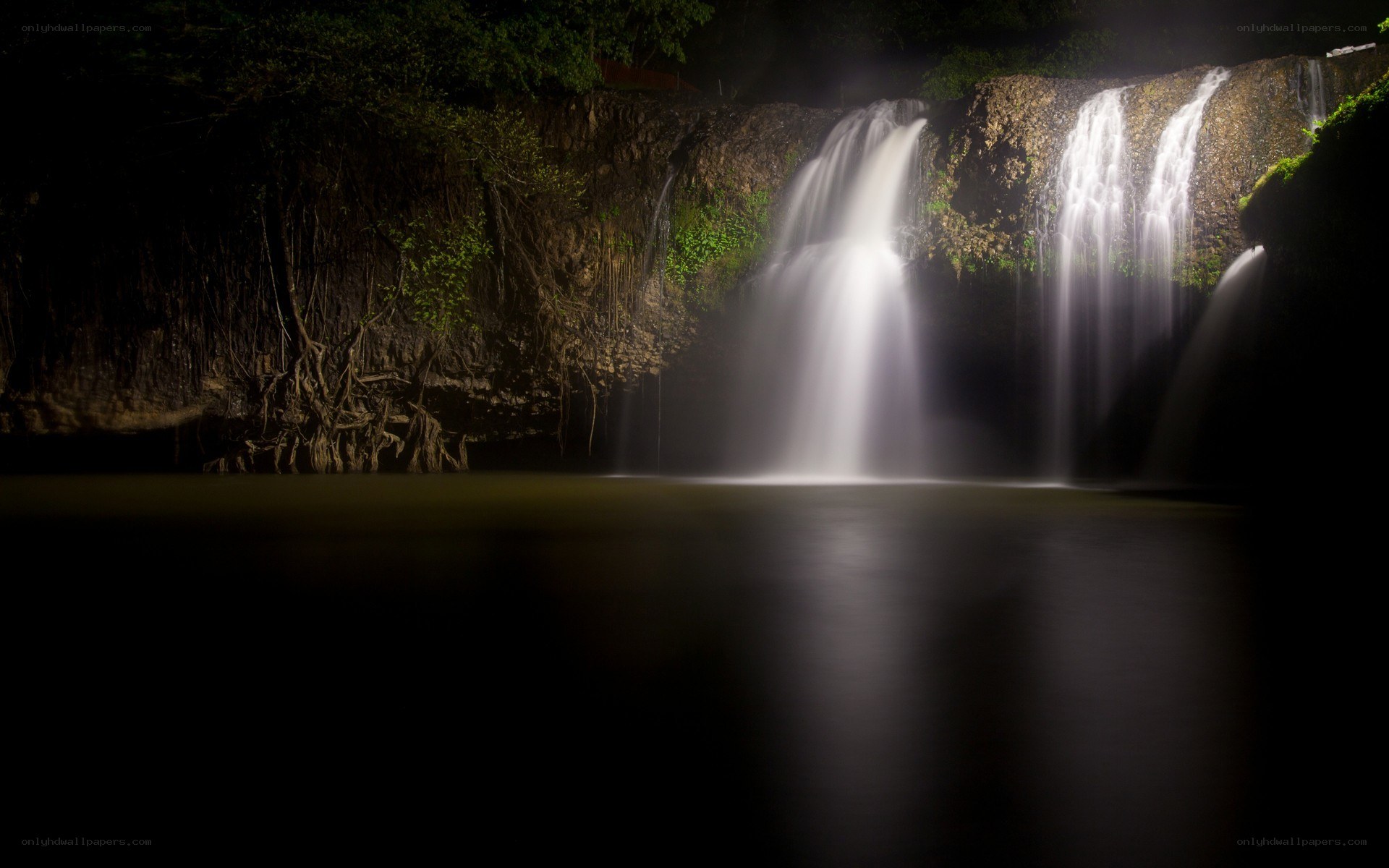 Waterfall at night illuminated