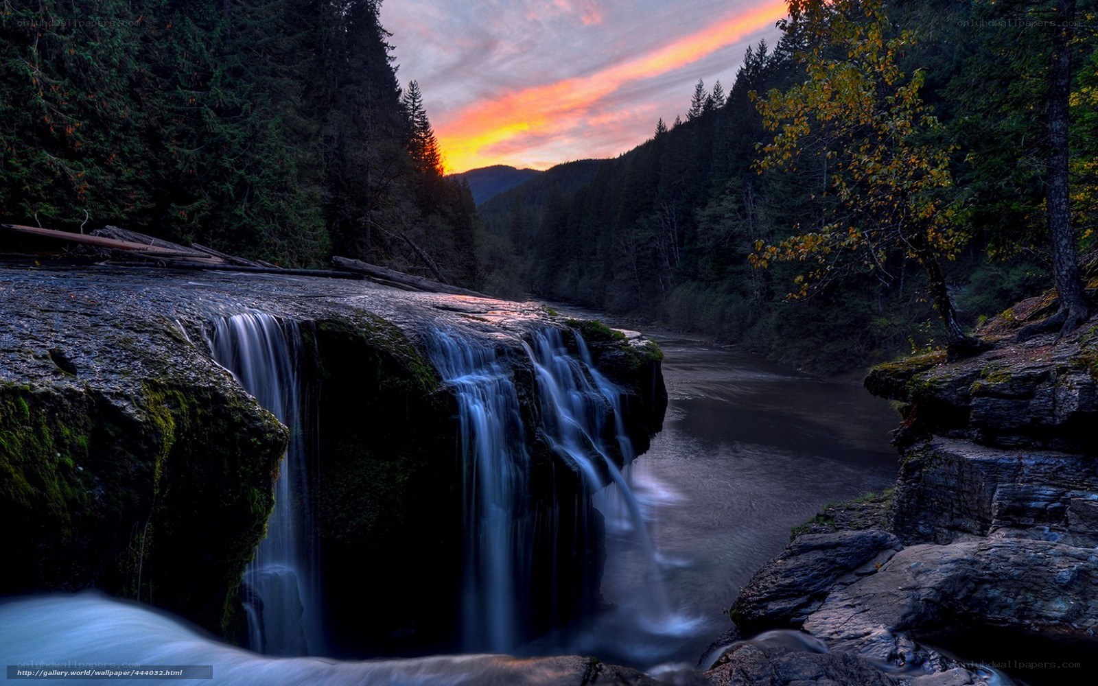 Waterfall at sunset in forest