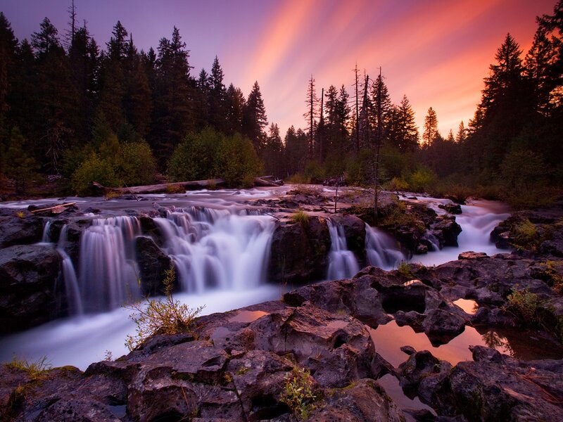 Waterfall at sunset in forest