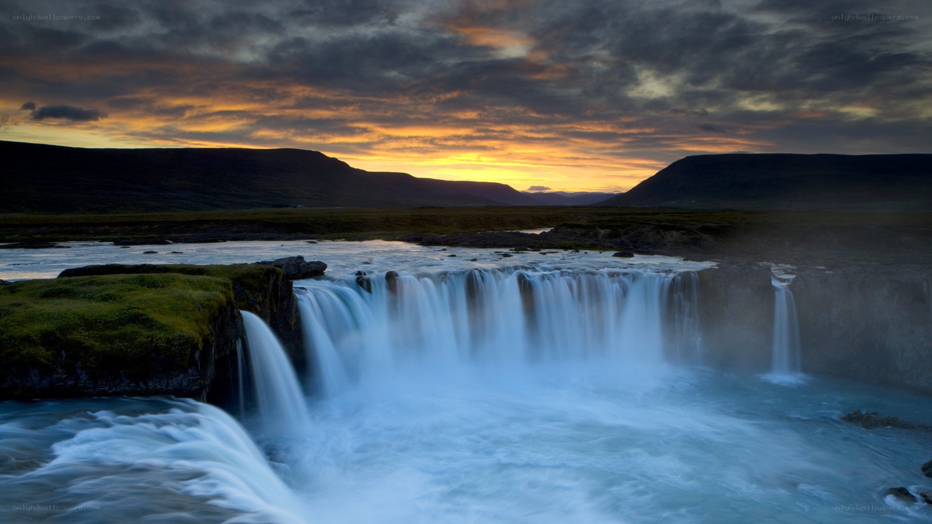 Waterfall at sunset in Iceland