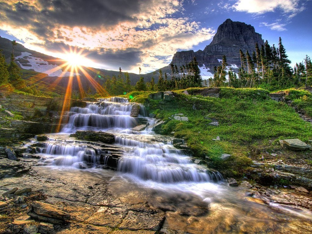 Waterfall at sunset in the mountains