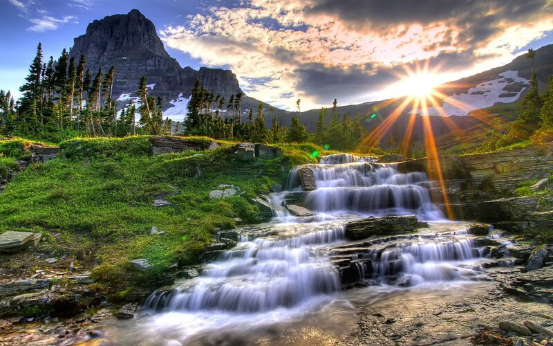 Waterfall at sunset in the mountains
