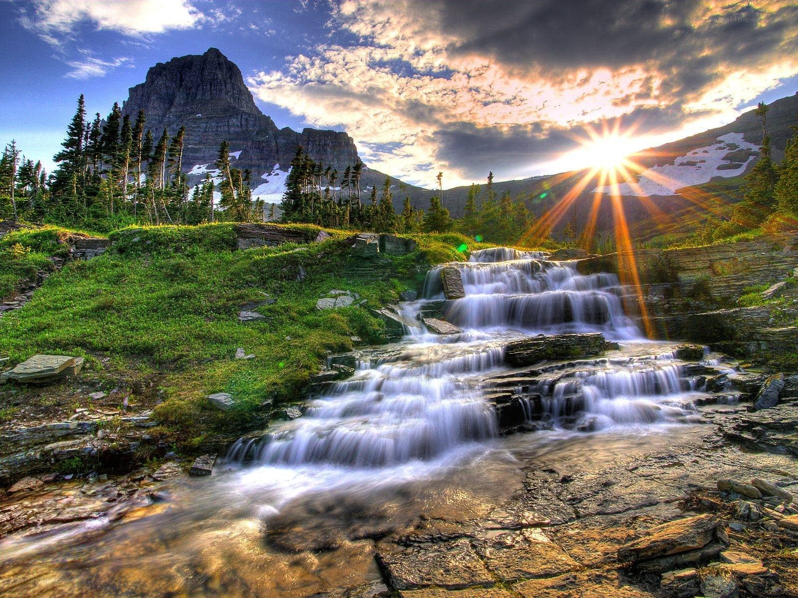 Waterfall at sunset in the mountains