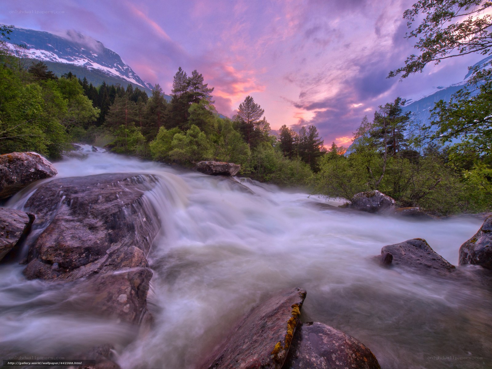 Waterfall at sunset in the mountains