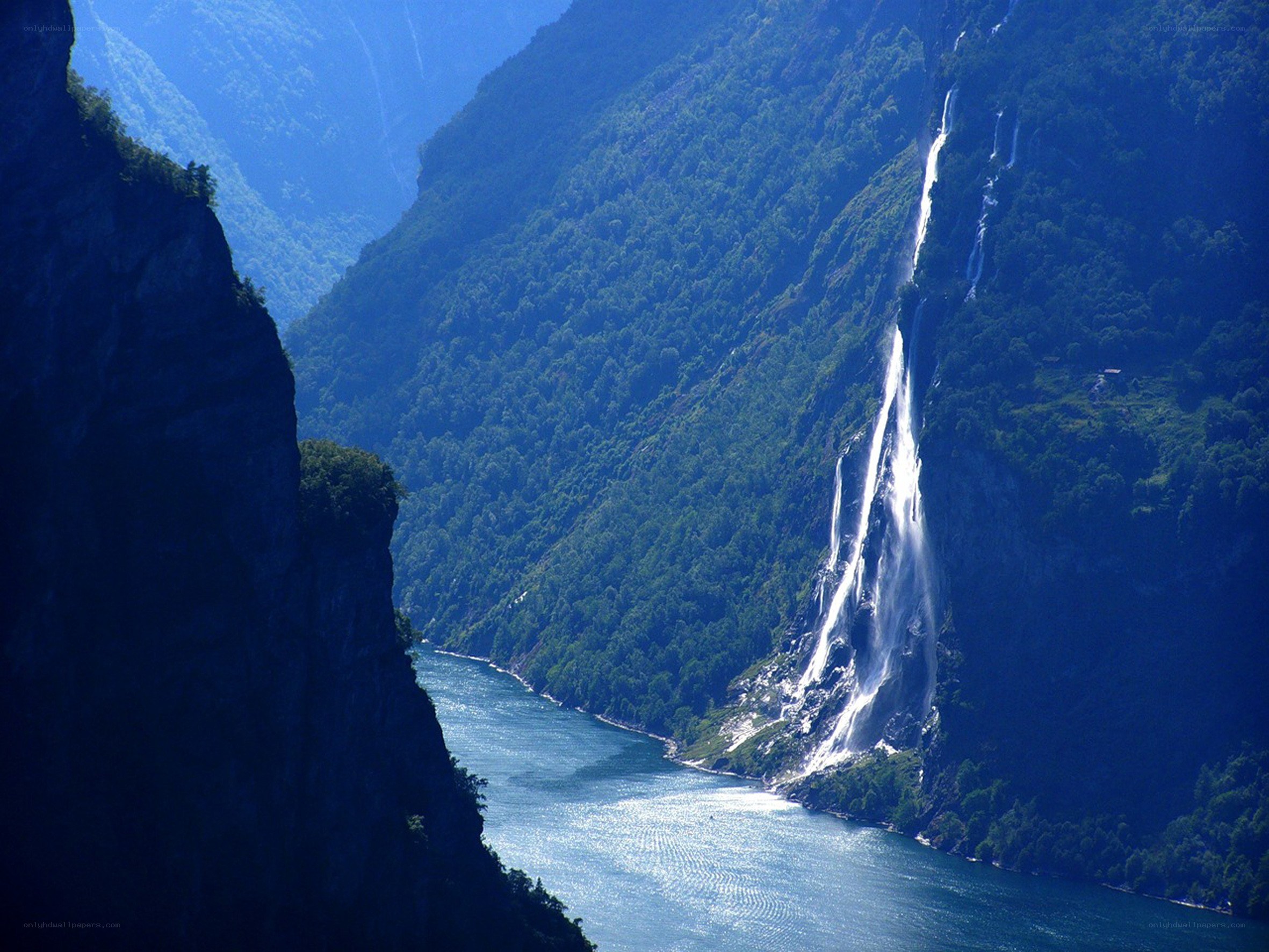 Waterfall cascading down a fjord