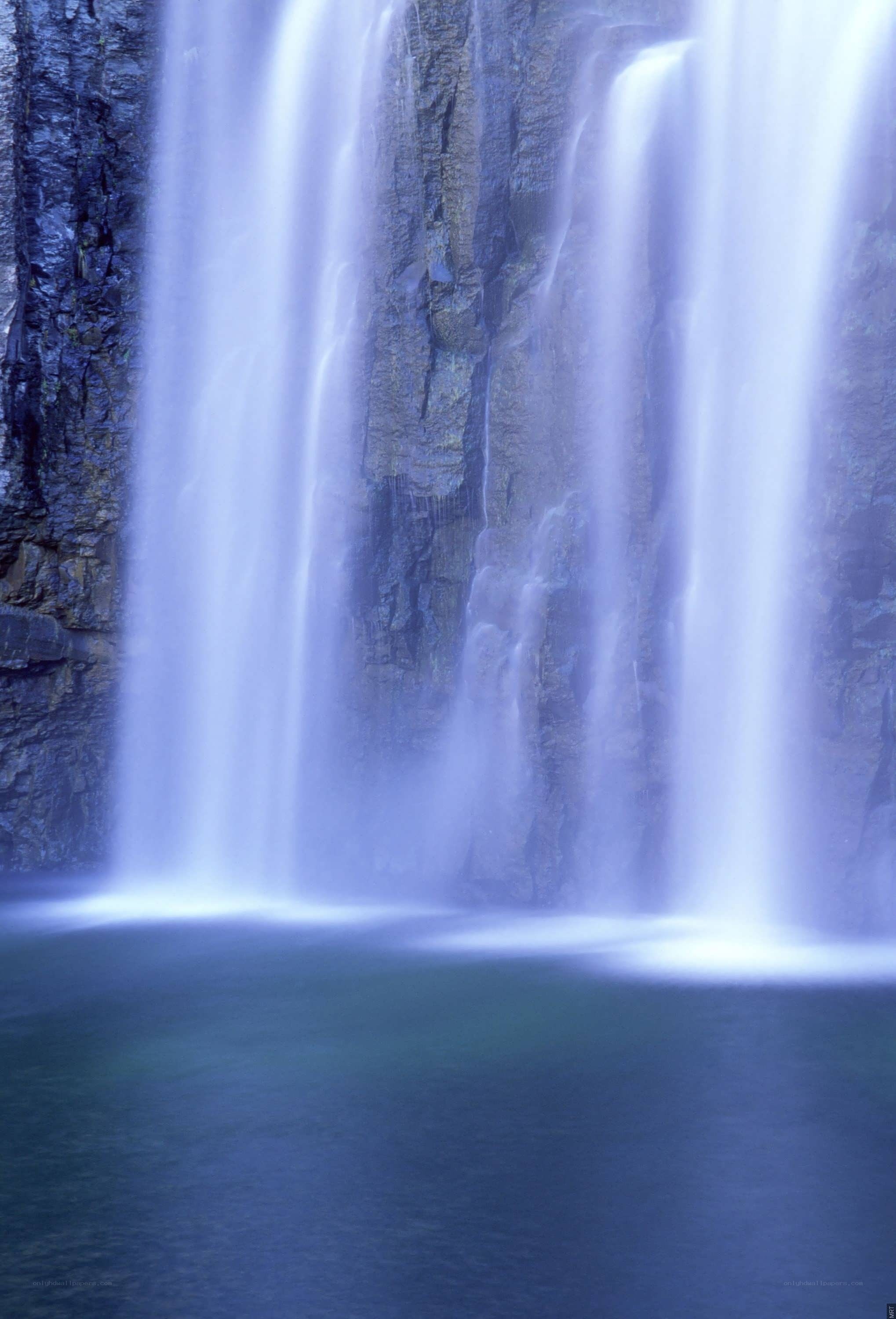 Waterfall cascading down cliff