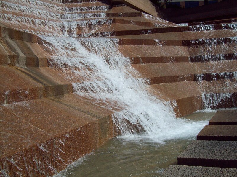 Waterfall cascading down stone steps