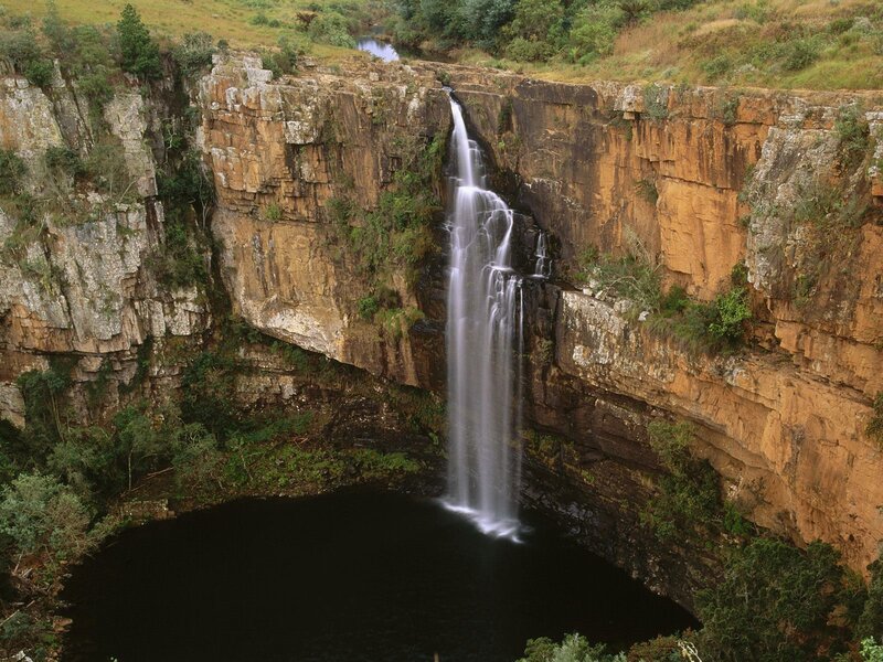 Waterfall cascading into a pool