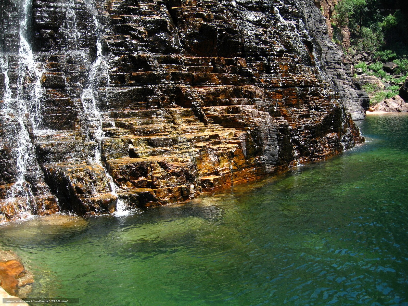 Waterfall cascading into a pool