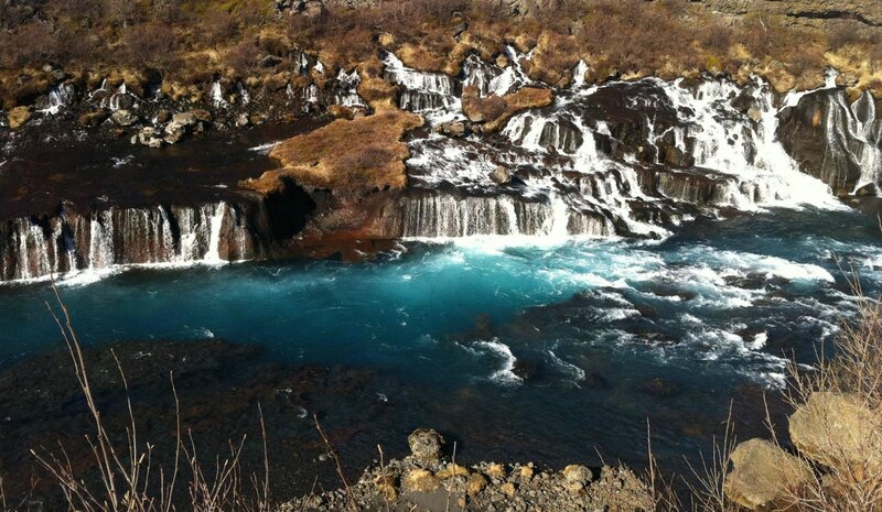 Waterfall Cascading into River