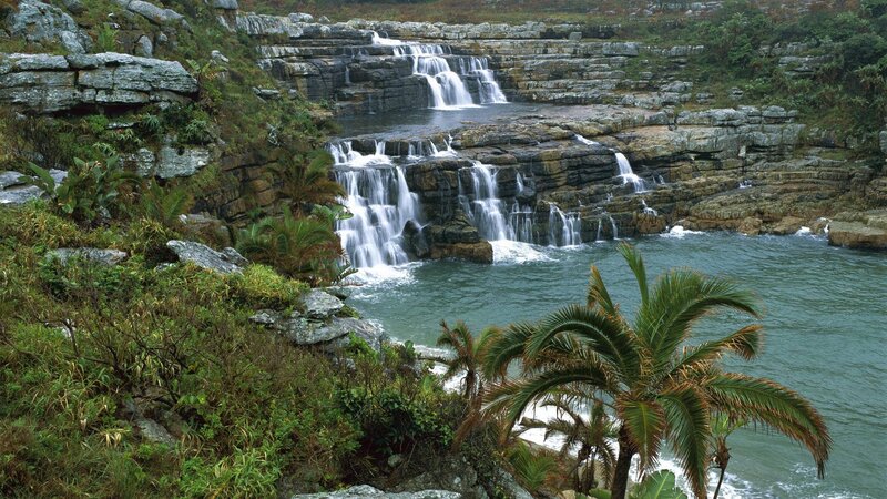 Waterfall Cascading into Sea — Green