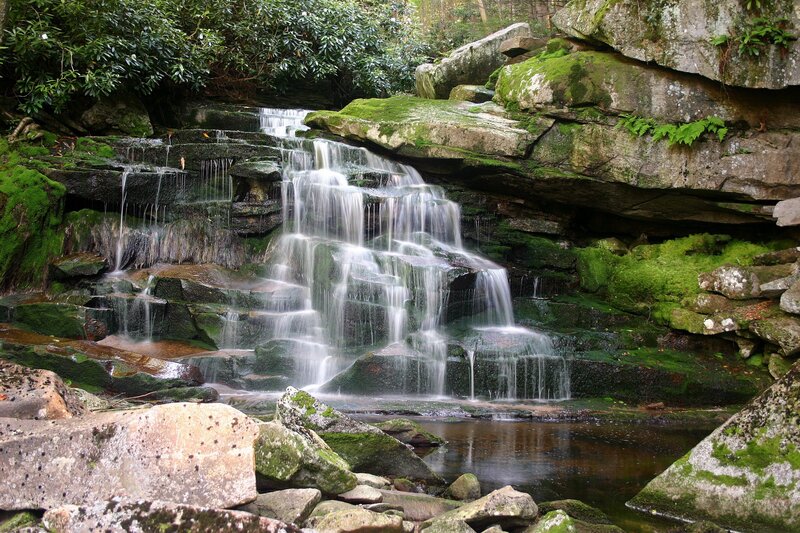 Waterfall cascading over mossy rocks