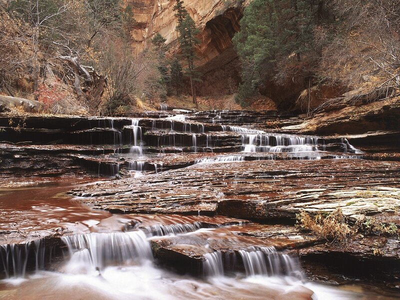 Waterfall cascading over rock formations