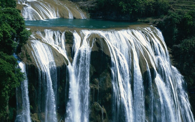 Waterfall Cascading over Rock