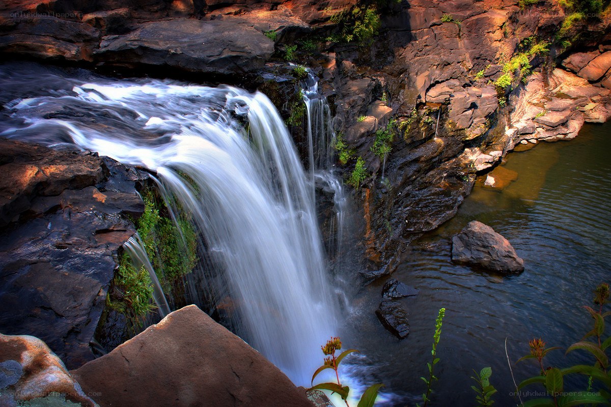 Waterfall cascading over rocks