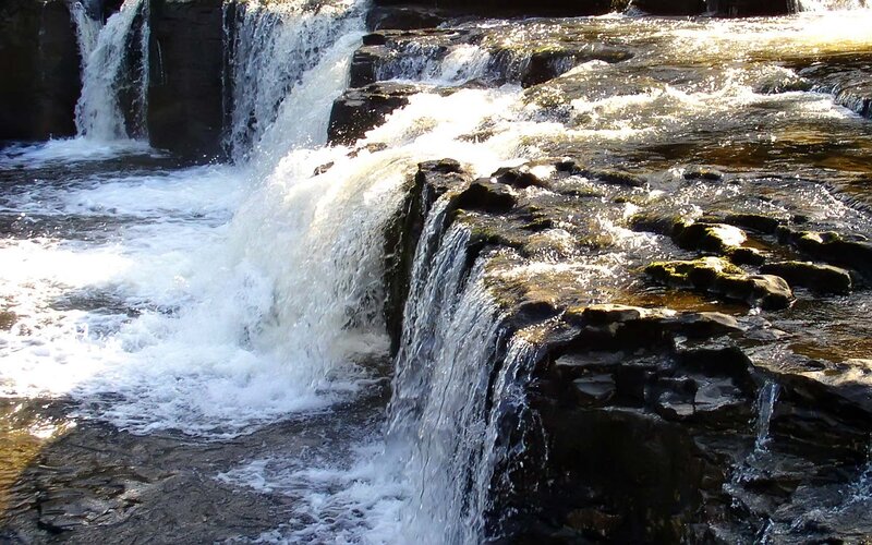 Waterfall cascading over rocks