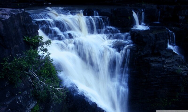 Waterfall Cascading over Rocks — Blue, Dramatic, Night