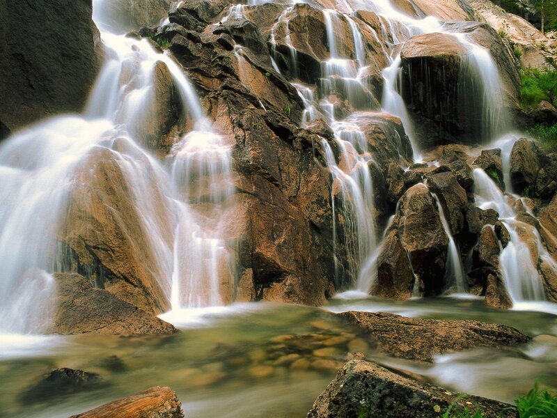 Waterfall Cascading over Rocks — Brown