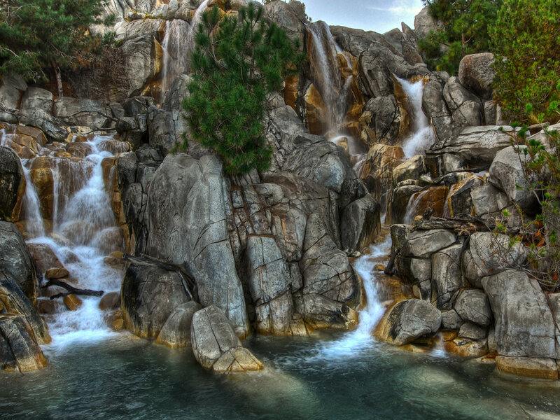 Waterfall Cascading over Rocks — Gray