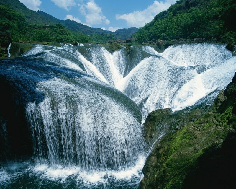 Waterfall Cascading over Rocks — Green