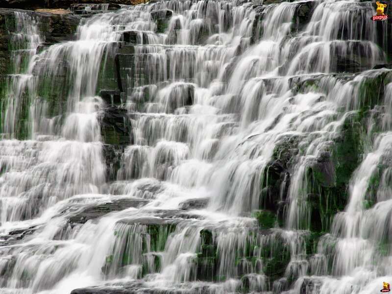 Waterfall Cascading over Rocks — White, Serene, Photograph