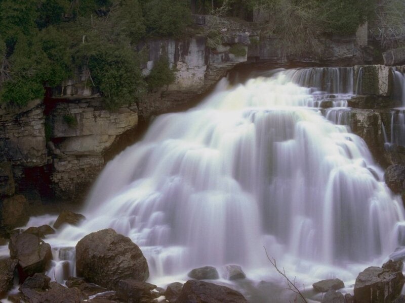 Waterfall Cascading over Rocks — White, Serene, Photograph, Trees, Cliff, Green