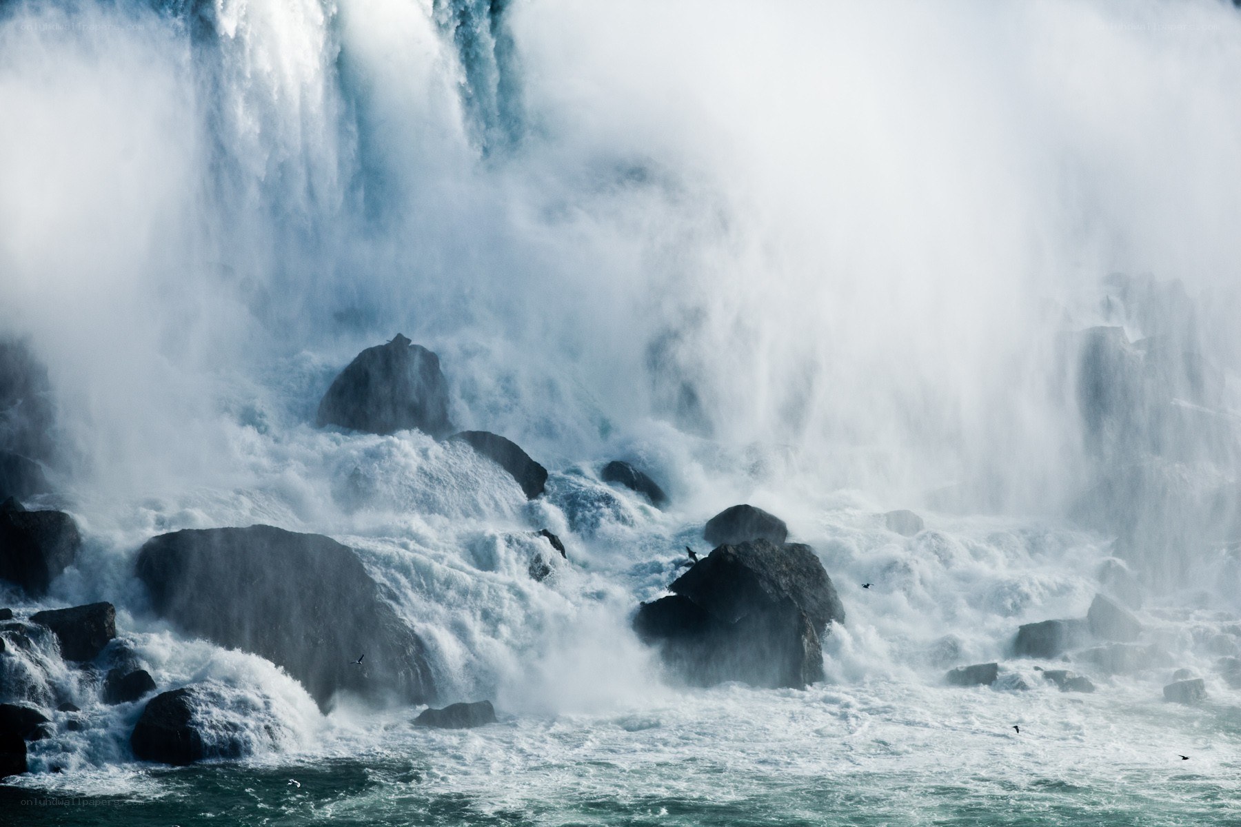 Waterfall crashing on rocks