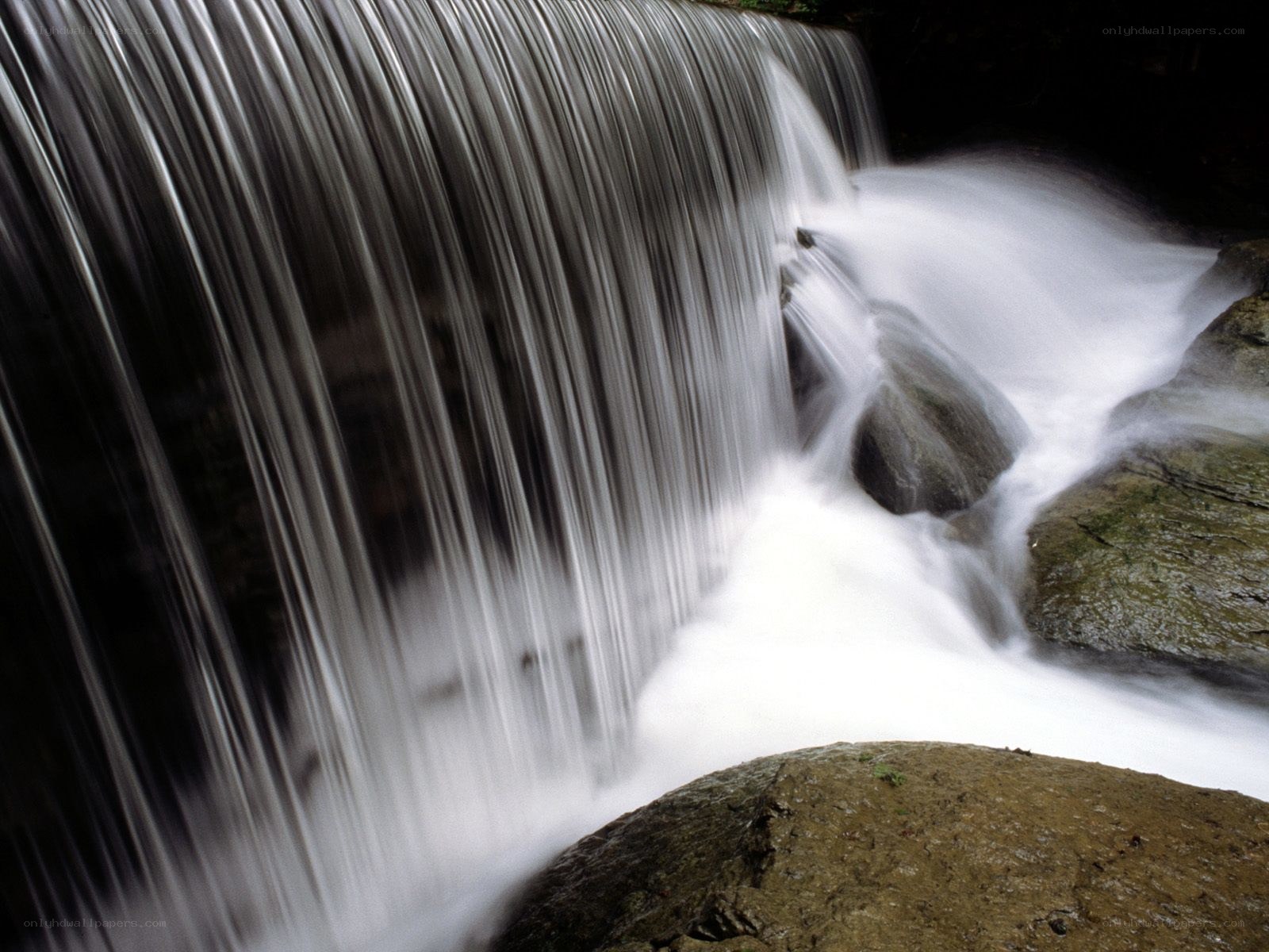 Waterfall flowing over rocks