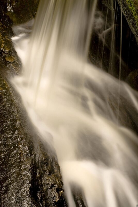 Waterfall flowing over rocks