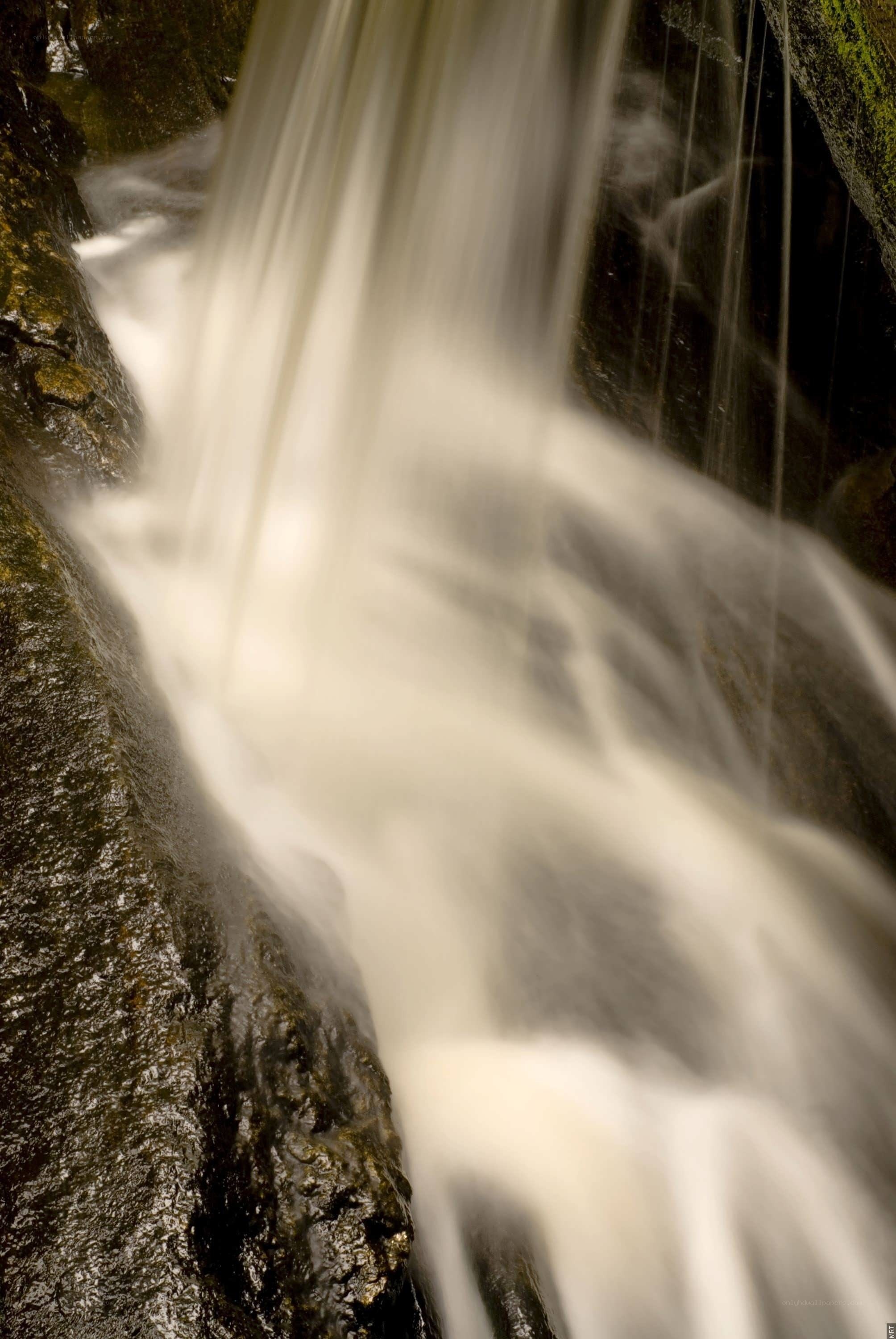 Waterfall flowing over rocks