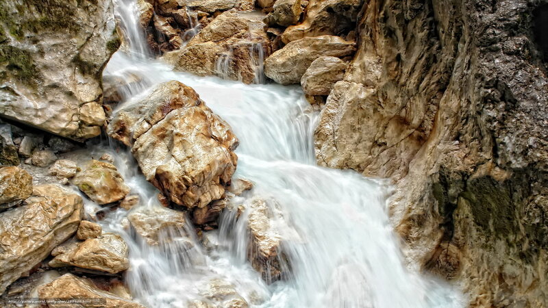Waterfall flowing over rocks
