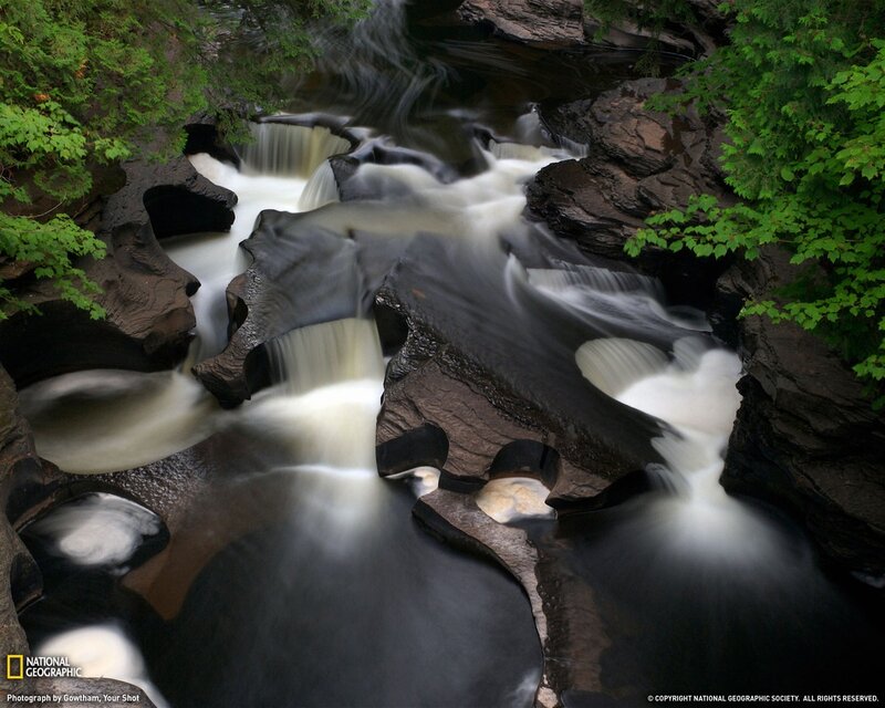 Waterfall in a forest canyon