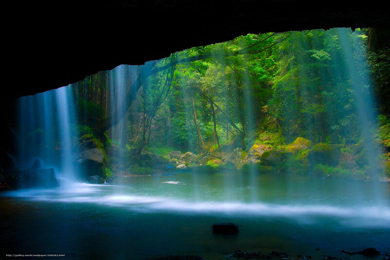 Waterfall in a forest cave