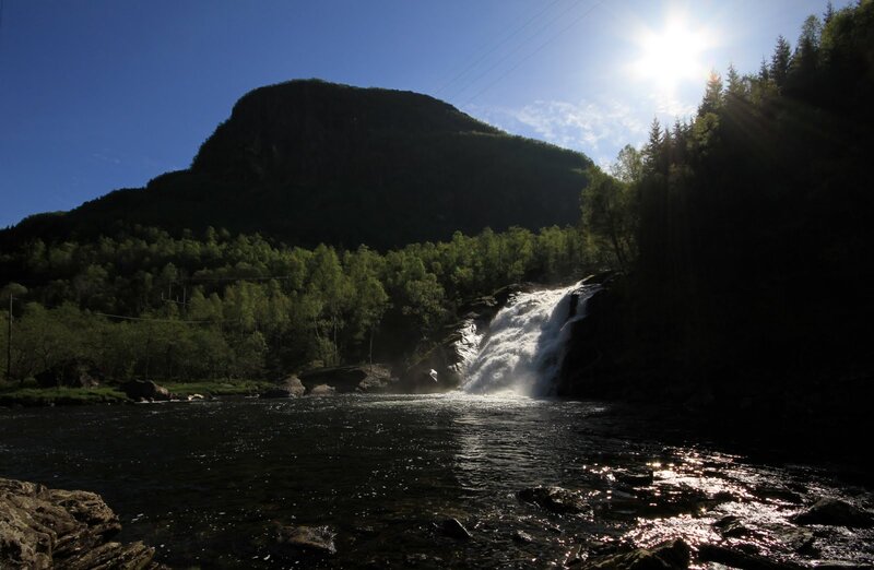 Waterfall in a forested valley