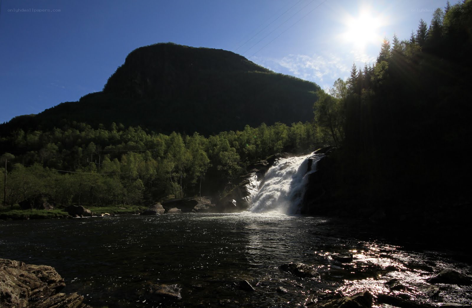 Waterfall in a forested valley