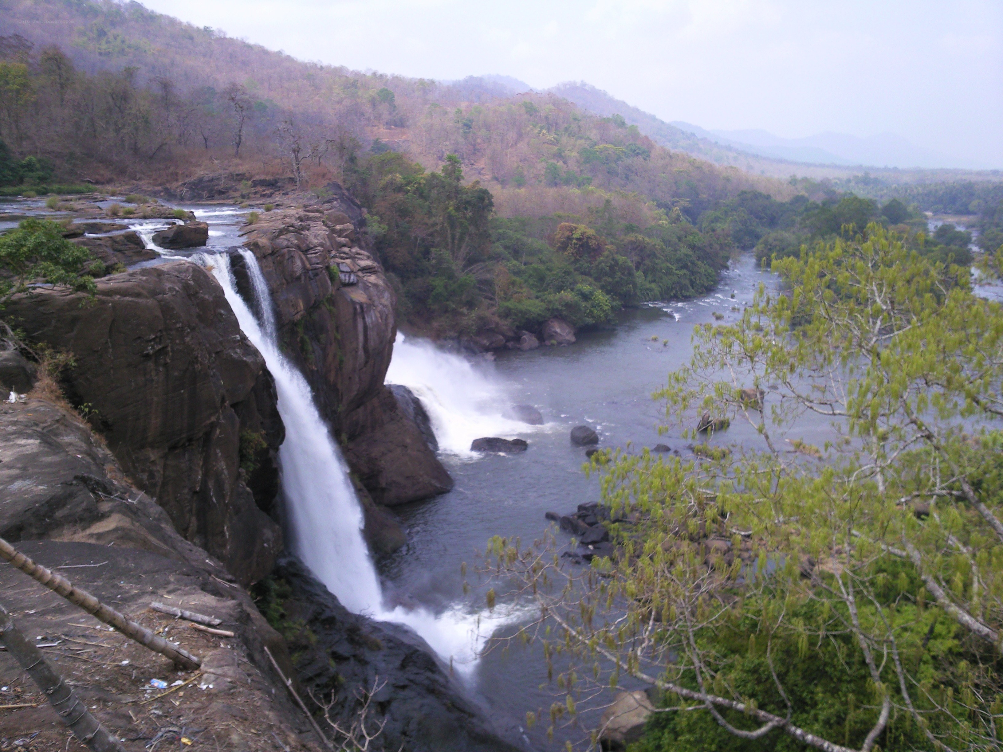Waterfall in a forested valley
